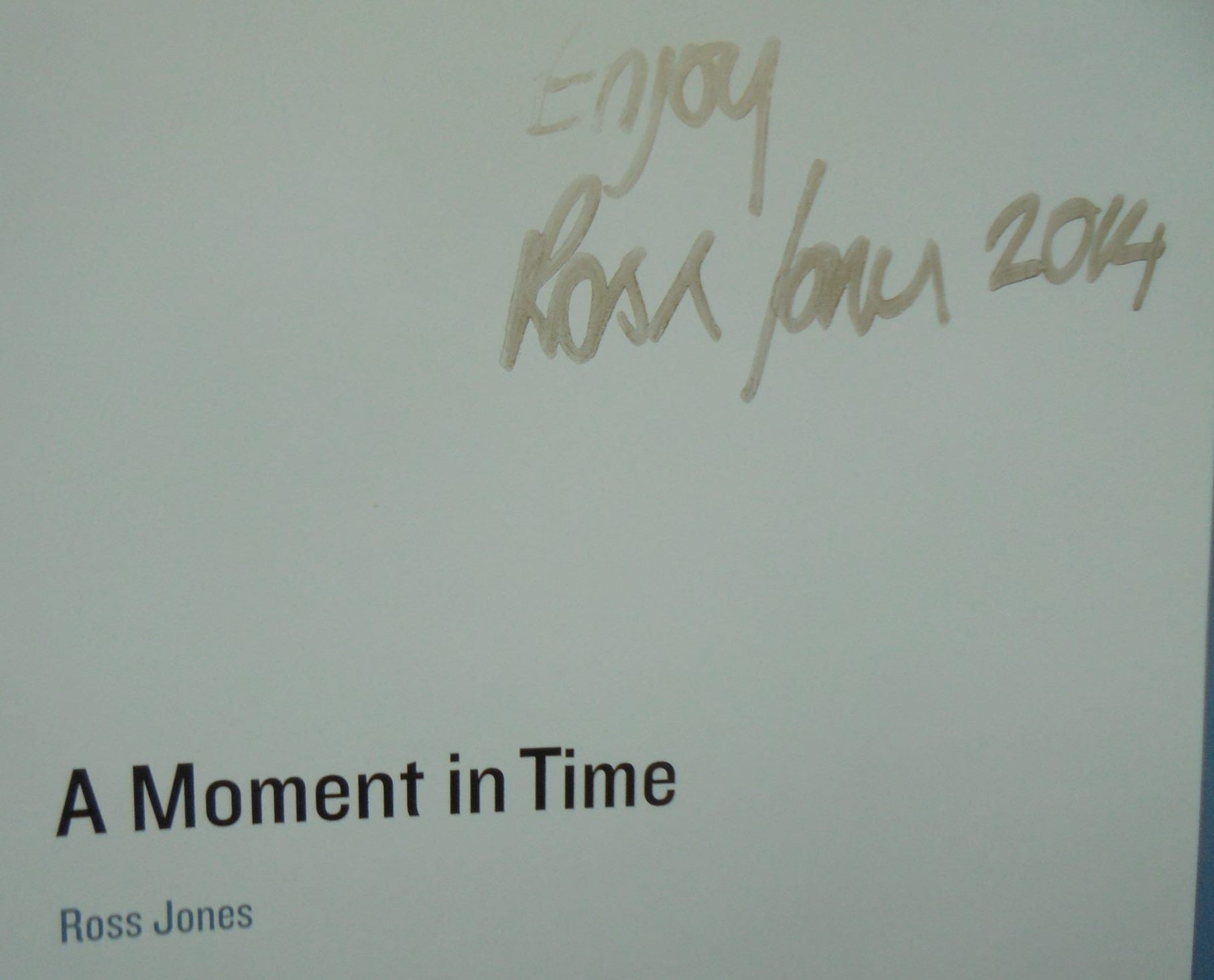 A Moment in Time by Ross Jones. 2014. SIGNED BY AUTHOR.