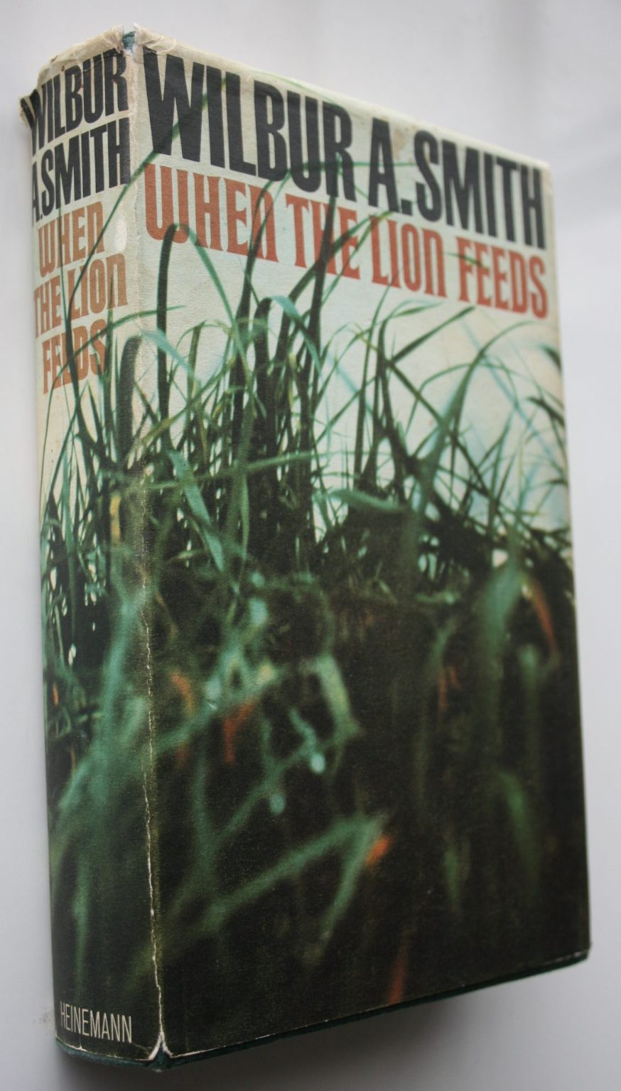 When the Lion Feeds By Wilbur A. Smith. 1964. SCARCE FIRST EDITION OF HIS FIRST NOVEL.