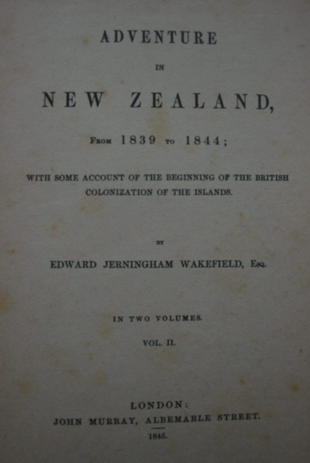 Adventure in New Zealand. Vol. 1 and Vol 2 by E.J. Wakefield. Volume One - Softback, good condition, heavily tanned and foxed, shelf wear - from 1839 to 1844