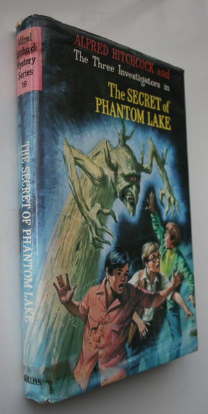 Alfred Hitchcock and the Three Investigators in the secret of Phantom Lake by William Arden. 1974, First British Edition. SCARCE TALL EDITION.