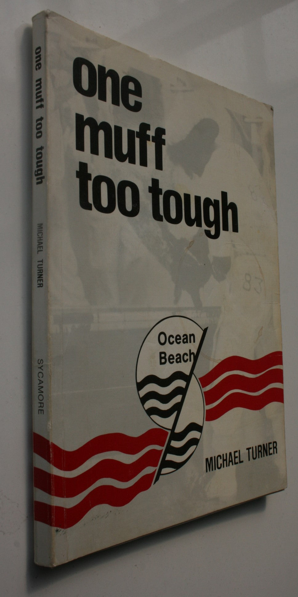 One Muff Too Tough: Ocean Beach by Michael Turner.