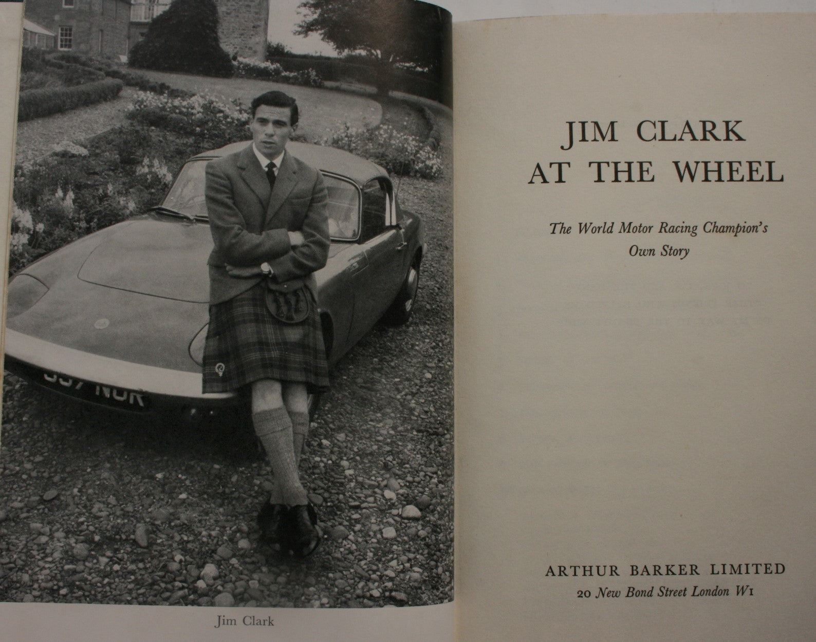 Jim Clark at the Wheel: The world motor racing champion's own story by Jim Clark. 1964, First Edition, first printing.