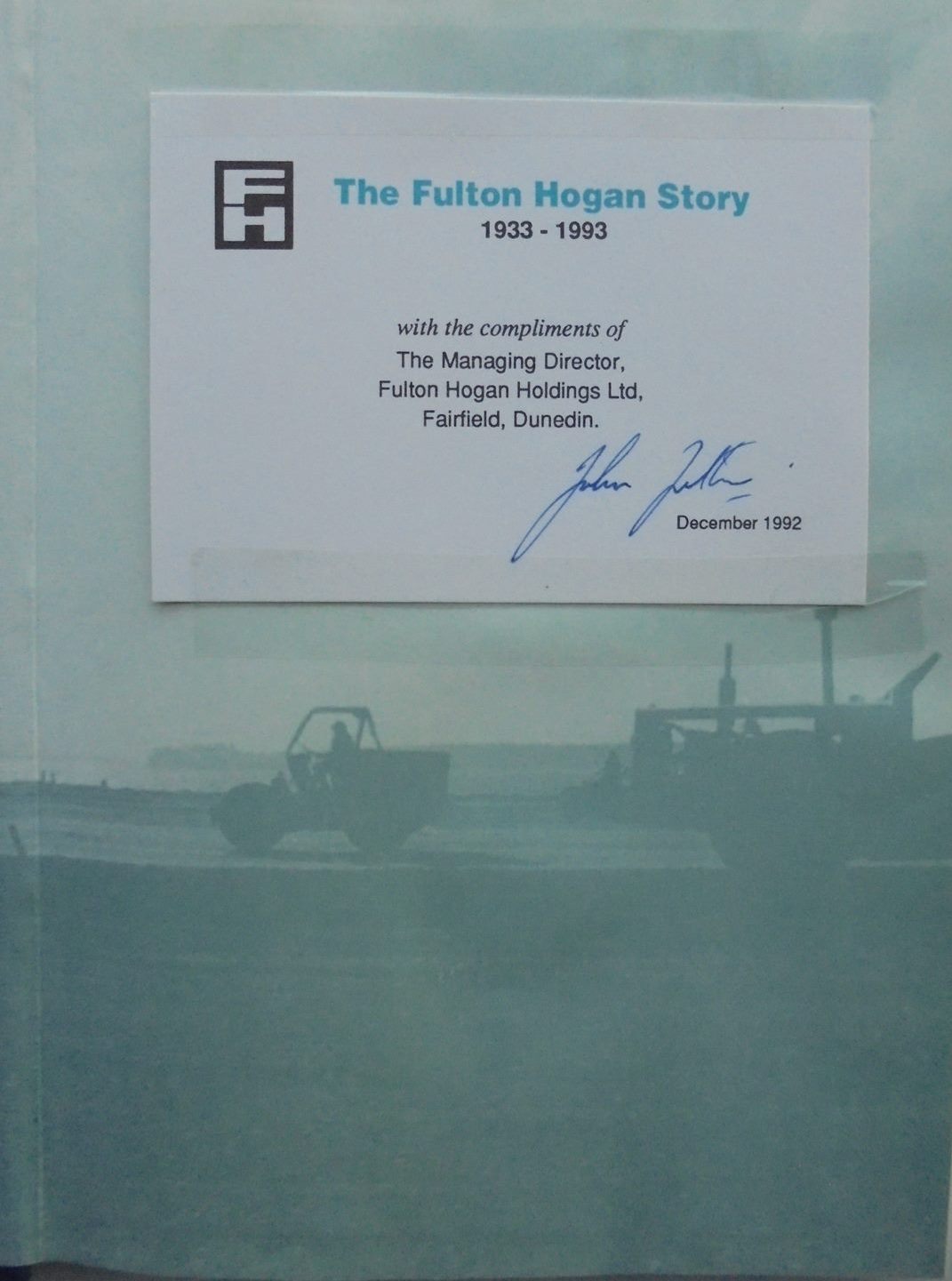 The Fulton Hogan Story 1933-1993 by A. R. Tyrrell. SIGNED BY Managing Director John Fulton & dated 1992.