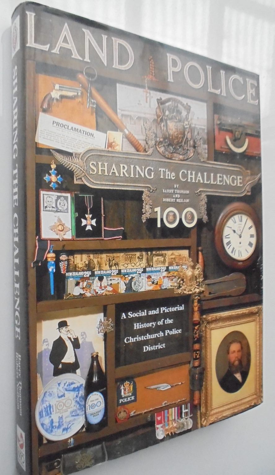 Land Police: Sharing the Challenge: A Social and Pictorial History of the Christchurch Police District By Barry Thomson and Robert Neilson. SIGNED BY AUTHOR ROBERT NEILSON.