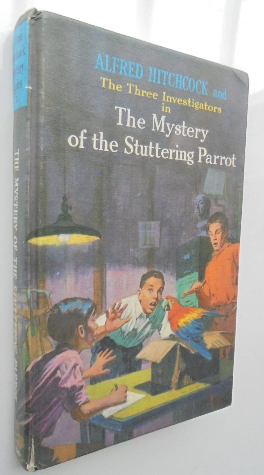 Alfred Hitchcock and The Three Investigators in The Mystery of the Stuttering Parrot by Robert Arthur, Illustrated by Roger Hall.