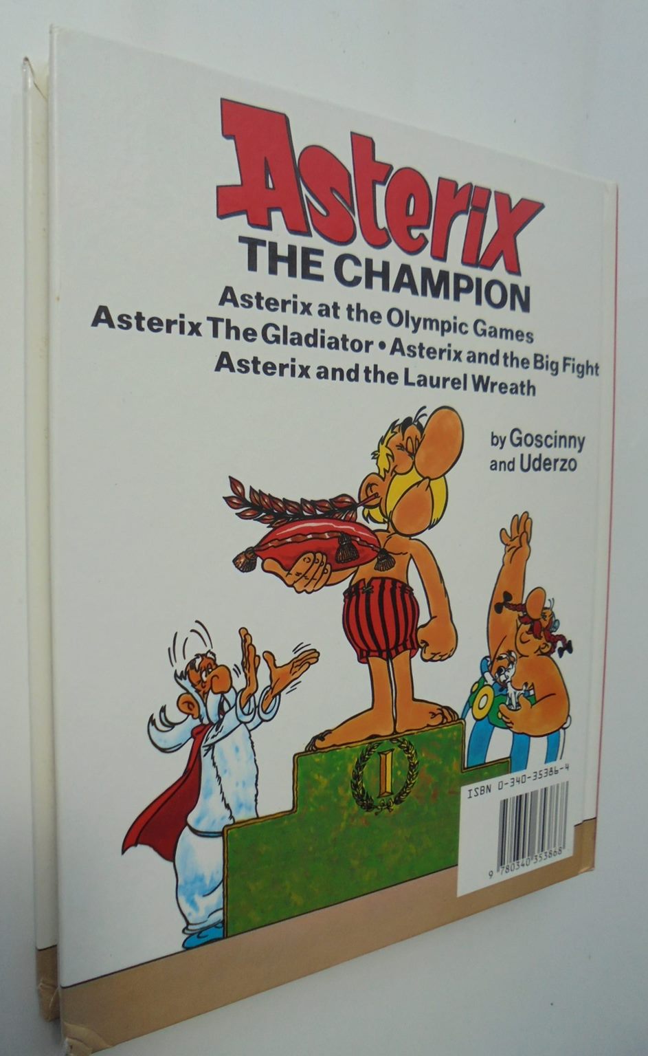 Asterix The Champion: (4 books in 1) Asterix at the Olympic Games Asterix the Gladiator Asterix and the Big Fight Asterix and the Laurel Wreath by Rene De Goscinny And M. Uderzo.