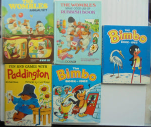Five vintage children annuals. The Bimbo books, The Wombles, Paddington.