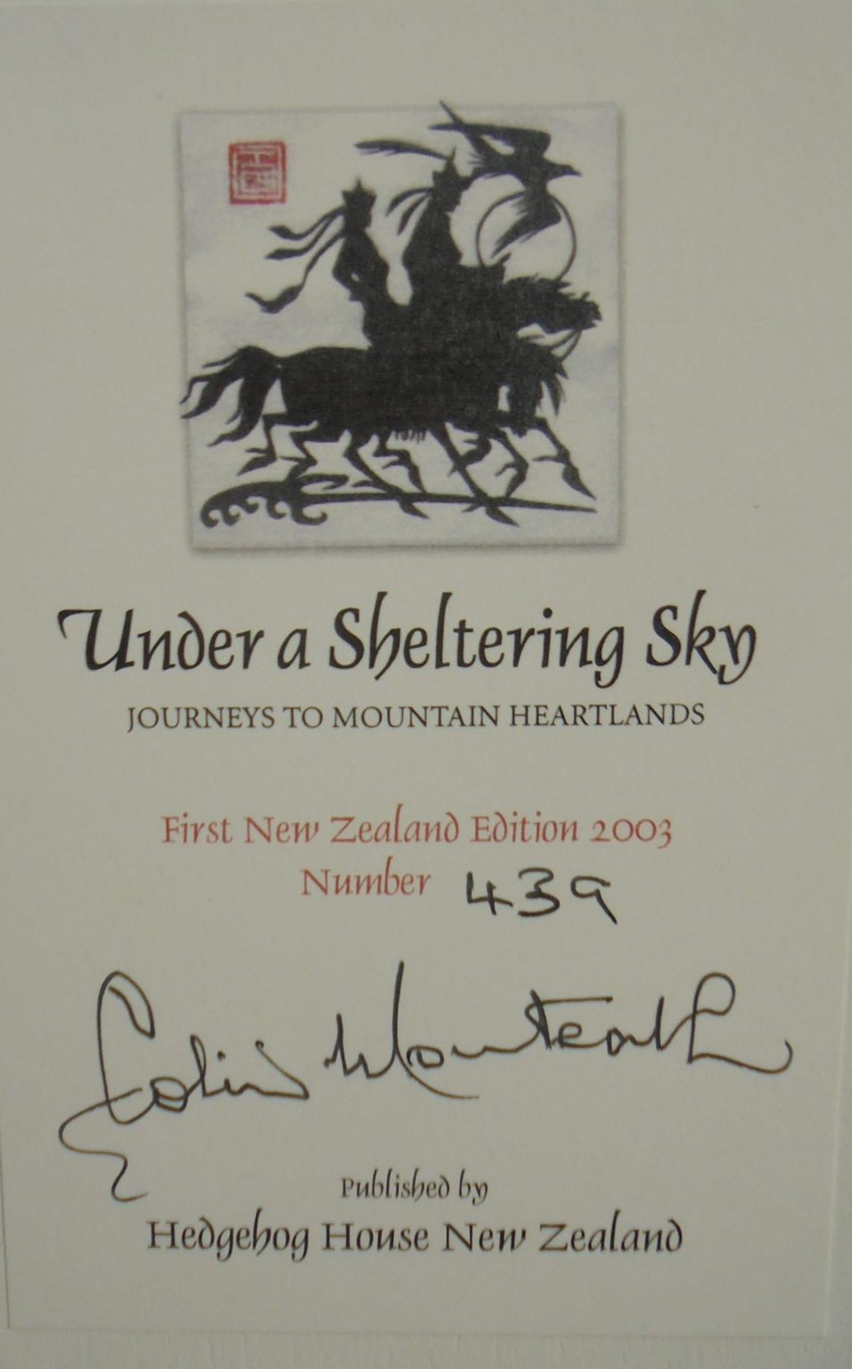 Under a Sheltering Sky Journeys to Mountain Heartlands By Colin Monteath. SIGNED BY AUTHOR. NUMBERED FIRST EDITION.