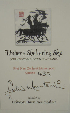 Under a Sheltering Sky Journeys to Mountain Heartlands By Colin Monteath. SIGNED BY AUTHOR. NUMBERED FIRST EDITION.